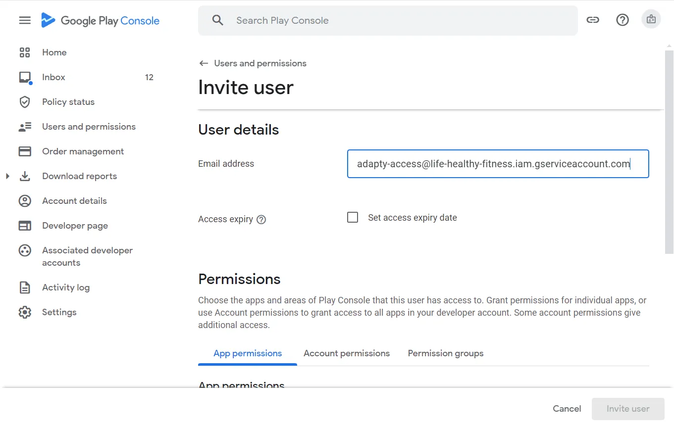 Google Play Console showing the Invite user form with email address field and permissions tabs